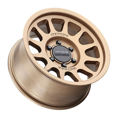 Method Race Wheels MR703, 17x8.5 with 6 on 135 Bolt Pattern - Bronze